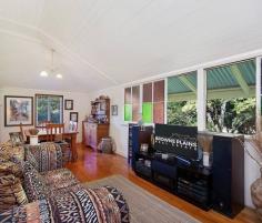  199 - 209 Rosia Road Park Ridge South QLD 4125 $2,250,000 Absolutely Stunning This original 1920s house is on the market for the first time in over 30 years. A highset Queenslander, Wattle House was originally relocated from Eagle Farm, Brisbane, being one of the first homes in Rosia Road. The north-facing timber home with its Hoop Pine floors and VJ walls has been tastefully renovated to offer modern conveniences without sacrificing character or charm. It is set amongst established landscaped gardens that are also home to abundant native bird and animal life. Large tile & timber tropical garden deck is perfect for BBQ parties & family gatherings. Features include: • Wraparound veranda at front and sides with ample living, entertaining space. • 3 bedrooms – 2 opening on to veranda, 1 with an adjoining office/study. • Spacious bathroom with double vanity, claw foot bath, walk-in shower & separate toilet. • Open plan kitchen, lounge and dining. • Kitchen design highlights quality solid recycled timber cabinetry, built-in dishwasher, electric cooktop & oven with rangehood. • Spacious laundry downstairs and separate powder room. • Ample storage downstairs. • Two reverse cycle air conditioners. • Magnetic insect screens throughout. • Full pressure town water • Full NBN coverage. Property also includes double carport and a large, powered rustic barn, 12m x 12m, with a 6m x 9m attached lean-to. Rainwater tanks holding 40,000 litres are attached to the barn. Quirky pieces such as a replica Aussie dunny are also among the rustic garden ornaments. Land is gently sloping, selectively cleared, with Macadamia trees leading down to thick, natural bush vegetation containing a dam at the property’s rear border. The land has been used for grazing horses and is now ready for any future endeavour the new owner may wish to pursue. It is ideal for someone who wants to live (or work) with space around them, yet still be close to everything the vibrant and fast-growing community of Logan City offers. Conveniently located within minutes of Park Ridge Town Centre and Grand Plaza shopping centre, the property is also in the school catchment areas of Parklands Christian College, Park Ridge State School and Park Ridge High School. The Logan and Gateway Motorways provide easy access to the Brisbane Airport (30 minutes), Sunshine Coast (60 minutes) and the Gold Coast (30 minutes). 