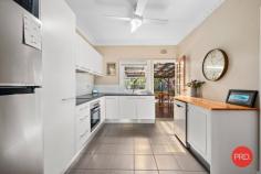  2 Grant Close Coffs Harbour NSW 2450 $689,000 - $739,000 Step into a charming three-bedroom home that exudes warmth and appeal. As you step through the doorway, your attention will be immediately drawn to the ornate ceilings and the natural beauty of the gleaming timber floors, infusing the space with a sense of timeless elegance. The thoughtfully executed upgrades throughout the house contribute to a modern living experience that seamlessly marries practicality with style. The open plan living/dining area has been cleverly designed to prioritize both comfort and convenience. Equipped with air conditioning to ensure your cool respite during warm days, and complemented by ceiling fans that enhance airflow, this space beckons you to unwind and entertain with ease. The main and second bedrooms offer a unique charm, seamlessly connecting to the outdoors through their access to a covered verandah. Imagine starting your day with a deep breath of fresh air and a view of the surrounding landscape - a refreshing way to begin each morning. Step outside, and you'll find a sprawling entertainment deck that commands attention as it overlooks the enclosed, level yard. Whether you're envisioning lively gatherings with friends around a sizzling barbecue or a quiet evening spent by the firepit, this outdoor haven provides an ideal setting. The generously sized garage extends its functionality beyond housing vehicles, boasting enough space to accommodate a workshop or additional storage - a practical feature catering to your varied needs. The location of this home is so convenient. Nestled within close proximity to transportation options, a bustling shopping center, and both high and primary schools, this residence ensures that everything essential is within easy reach. Moreover, the allure of local beaches is only a 5-minute drive away, offering you the chance to soak up the sun's warmth and embrace the soothing embrace of the sea whenever you desire. This residence presents a remarkable opportunity tailored to a diverse array of buyers. Whether you're a first-time buyer embarking on the journey of homeownership, an astute investor seeking a property brimming with potential, or a retiree yearning for a tranquil abode, this home effortlessly accommodates all. Embrace the chance to claim this great property as your own, and immerse yourself in a lifestyle that harmoniously blends comfort, elegance, and unparalleled convenience. 