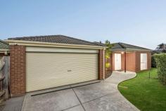  26 Bushlark Drive Carrum Downs VIC 3201 $670,000 - $737,000 Awash with natural light and ready to be enjoyed, this spacious four bedroom home showcases an exciting upsizing opportunity for growing families in a peaceful residential enclave beside Jacana Playground. Positioned on an easy-care 493m2 (approx) allotment with a lovely lawn for kids to play complete with built-in swings, the residence features two well-sized living areas and an interconnected dining room with woodgrain flooring and light tones to infuse your own style and decor. A full-sized family kitchen in the heart of the home is fitted with a breakfast bar, gas cooktop and stainless-steel oven and dishwasher, while glass doors off the family room invite you out to an expansive alfresco patio beneath a high-pitched pergola. Thoughtfully considered family zoning puts the three junior bedrooms with built-in robes and a full family bathroom at the rear of the single-level residence, affording parents peace and privacy in the master bedroom with a walk-in robe and ensuite. A short drive to Aldercourt Primary School, Carrum Downs Secondary College and Carrum Downs Regional Shopping Centre, the property includes ducted heating, reverse-cycle airconditioning, a double garage and exciting scope to update. 