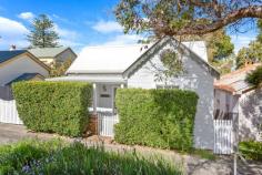  80 Shoalhaven Street Kiama NSW 2533 $2,300,000 - $2,500,000 Pretty as a picture and perfectly positioned for enjoying Kiama's quaint village lifestyle and accompanying ocean views is this timeless cottage, "Summerfield", admired by many passers-by is easily identified by its welcoming white picket fence and charming exterior. Situated within an easy stroll 100m to restaurants, cafes, library, shops, rail service (direct to Sydney CBD and airport), harbour, pristine beaches, stunning coastal walking tracks, schools, and health services. Features to highlight on this property include: • 	 Charming, centrally located cottage in central Kiama with ocean views • 	 Renovated and extended by renowned builder Ian Killmore & Sons • 	 Situated on an easy to maintain 320m² parcel of land with side access • 	 Fantastic family home with four bedrooms, two bathrooms and two living areas • 	 Cedar timber flooring upstairs with original cedar panelling feature on lining on stairs • 	 Renovated kitchen with Butlers sink, feature pendants, with all modern appliances • 	 Beautiful stained glass windows and French stacker doors opening out onto your balcony • 	 Excellent long-term investment in one of just a few metro satellite towns in NSW If you yearn for a retreat to a quieter, simpler life reminiscent of yesteryear, then look no further, "Summerfield" Kiama awaits you now. For more information on this unique piece of real estate, please contact Michele Lay on 0409 461 756 or Matthew Lay on 0448 440 609. 