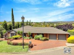  2 Glade Ct Greenwith SA 5125 $829,000 - $869,000 Welcome to 2 Glades Court, Greenwith. This large family home is set back on a beautiful 760sqm allotment outlooking the greater Greenwith and Golden Grove areas. Within close proximity of local shopping precincts, public transport, parks and schools this property is the pinnacle of convenience in a family location. The home which comprises of well-established gardens, updated kitchen and living rooms, large bedrooms and large rear yard. No expense has been spared in maintaining and keeping this home up to modern day living standards and is a testament to its owners. The home features: * Double width driveway as well as a second separate driveway perfect for another car, caravan or boat. * Upon entry newly appointed flooring is present throughout the home and flows into the front living area with large windows, allowing an abundance of natural light to flood the room. * A flexible second living space is perfect for a formal dining area, study or extension of the already present living room. * Large updated kitchen with stainless steel appliances, pendent lighting, waterfall stone bench tops and breakfast bar which outlooks the meals and third living space. * The open planned kitchen, meals and dining area outlooks the rear yard and entertaining area with fantastic views * The master bedroom includes large ensuite with floor to ceiling tiles and walk-in robe * The remaining three bedrooms includes built in robes and two include ceiling fans, they also all surround the main three-way main bathroom with newly appointed features and floor to ceiling tiles * Outside a large entertaining area outlooks the manicured gardens with direct access into the double garage Other features include: * Water tank with fire hose real * Evaporative cooling * Gas heating * 3.6kw of solar power * Remote Garage * Garden Shed 