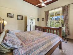  60 Goads Road Mardan VIC 3953 $1,180,000 Meander through the hills, off the main road, down a country lane, and you will find the peaceful charm of the beautiful 'Nampara'. Est. in 1908 this Edwardian home is set amidst a glorious european and native garden set on a tranquil 5 acres in the Dumbalk Valley. The period home has enjoyed updates over the years whilst still retaining its original character with 12ft corniced ceilings, timber floors, french doors, and the gorgeous bay windows with surrounding spacious verandas. The kitchen and dining room features a beautiful north facing window, welcoming the morning sunshine, in a home that offers both relaxed and formal living spaces with garden views throughout the home. Featuring: - Country Kitchen with electric cooking, dishwasher, and gorgeous garden views - Separate family living room, alongside formal dining, with french doors opening out to the veranda. - 3 spacious bedrooms with an ensuite and walk in robe off the master. - Family bathroom with adjoining european laundry with great storage. - Heating and cooling of the home taken care of by a Gourmet wood heater providing hydronic heating throughout the home and a second Heatcharm wood heater in the living room in addition to two reverse cycle air conditioners. Externally: - Enjoy the inground swimming pool, perfect on a hot summer's day! - Two car carport, two wood / garden sheds and sundry storage areas. - A former shearing shed has now been converted to a workshop, with a studio room providing great storage space suitable for crafting or home office. - 5 KW Solar System and a 2.2 megalitre water licence from the Tarwin River East branch. - The ever-changing garden of Jacaranda, Maple, Ginko, Beech, Banksia, Woolamai Pine, ferns daffodils, and roses galore. - Orchard plantings of various citrus and apple varieties, mulberry, berry patch, veggie garden and adorable chicken coup with yard. A picturesque seasonal creek runs along the property edge providing water for the garden pond. There are two small front, fenced paddocks, ideal for a horse or a couple of beef cows. Centrally positioned, 14 min. to the vibrant village of Meeniyan, 20 min. to Mirboo North, 25 min. to Leongatha for major supermarkets, hospital, and sporting facilities all an easy drive to the beaches of Waratah Bay and Walkerville and 2 hrs from Melbourne.  