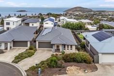  35 White Close Encounter Bay SA 5211 $680,000-$745,000 Set on a peaceful cul-de-sac, this fluid four-bedroom, two living room home on an easy-care 516m2 is ready to provide stylish and comfortable living with views across the sea in Encounter Bay. Originally built to a high standard in 2015 over a fluid single storey, a contemporary façade hints at the quality that continues throughout, from Colorbond roofing to a timeless colour palette. Enter the home onto easy-care tiles. To your right, the main bedroom boasts plantation shutters, a walk-in robe and polished private ensuite, while tucked down a separate hall to the rear, three more carpeted bedrooms offer built-in robes and quality coastal-inspired blinds. Bright in white, the adjacent main bathroom includes a large bath and shower and a handy separate toilet. Two living spaces create floorplan flexibility for entertaining and relaxing alike, with a carpeted living space along the hall ideal for cosy movie nights or curling up with a book. Connecting the indoor and outdoor living spaces, the open plan living is ideal for entertaining and summer living. A generous kitchen comes together between generous bench space and plentiful storage. Punctuated with quality Westinghouse appliances including a gas cooktop electric oven, you'll love its practicality and connectivity. The spacious lounge and dining space allow plenty of room for a family-size couch and entertainer's dining table, yet you'll live for warm days that allow you to dine Alfresco. From the outdoor entertaining you can settle in for meals with views across the ocean to The Bluff, reminding you daily why you made the move to this gloriously elevated patch of Encounter Bay. Whether you're choosing a coastal backdrop for the family years or are settling in for a slower pace and retiring in style, this wonderful home is ready to deliver on contemporary comfort and coastal proximity from the quiet suburban backdrop of White Close. Just nine minutes to the heart of Victor Harbor, shopping convenience is all yours. In your free time enjoy endless recreation, from McCracken Golf Club to exploring Waitpinga, walks up Granite Island and The Bluff, and drives to the scenic neighbouring towns of Port Elliot, Middleton, Goolwa and so much more. More features to love: - Reverse cycle ducted A/C throughout - Secure double garage with panel lift door and further off-street parking - Laundry with plenty of storage and external access - 6.6kW solar system installed June 2021 - Rainwater tank plumbed to W/C - Easy access to Victor Harbor Primary and High schools and Investigator College and within the catchment area for Victor Harbor Community Kindergarten - 4km to the heart of Victor Harbor and 87km to Adelaide Specifications: CT / 6155/399 Council / Victor Harbor Zoning / HN Built / 2015 Land / 560m2 (approx) Frontage / 7.31m Council Rates / $2,400.45pa Emergency Services Levy / $118.90pa SA Water / $206.73pq Estimated rental assessment / $550 - $600 per week / Written rental assessment can be provided upon request Nearby Schools / Victor Harbor P.S, Port Elliot P.S, Goolwa P.S, Mount Compass Area School, Yankalilla Area School, Victor Harbor H.S, Goolwa Secondary College 