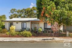  19 Mary St Kapunda SA 5373 $439,000 - $459,000 Nestled on a quaint corner block at 19 Mary Street in the charming town of Kapunda, this adorable residence embodies the perfect blend of comfort, character, and convenience. With its cute and quirky facade, this property boasts a plethora of delightful features that make it an ideal home for those seeking both charm and functionality. Upon entering this lovely abode, you are greeted by a newly renovated bathroom and kitchen area, exuding modern elegance and style. The seamless integration of contemporary fixtures and fittings with the home's original charm creates a unique and inviting atmosphere that is sure to captivate guests and residents alike. The kitchen, with its sleek countertops and ample storage space, provides the perfect setting for culinary adventures and family gatherings. The house offers three cozy bedrooms, each providing a peaceful sanctuary for rest and relaxation. Whether you're curling up with a good book or drifting off into a restful sleep, these bedrooms offer a tranquil retreat from the hustle and bustle of daily life. One of the highlights of this property is its gorgeous garden, which has been lovingly maintained and nurtured over the years. From the moment you step outside, you are greeted by an array of vibrant flowers, lush greenery, and fragrant fruit trees that create a serene oasis in the heart of the town. Additionally, tucked away at the side of the house, you'll discover a secret garden, providing a secluded spot for quiet contemplation or intimate gatherings with friends and family. For those who enjoy tinkering or pursuing DIY projects, a large shed with a workbench and shelving is included, offering plenty of space for storage and creative endeavors. Whether you're a seasoned craftsman or a weekend hobbyist, this versatile space is sure to inspire your next project. Conveniently located close to all amenities, including shops, schools, and public transportation, this property offers the perfect balance of tranquility and accessibility. Whether you're running errands or exploring the town's charming cafes and boutiques, everything you need is just a stone's throw away. In summary, 19 Mary Street is more than just a house; it's a place to call home. With its irresistible street appeal, lovely layout, and abundance of delightful features, this property offers a truly magical living experience. Don't miss your chance to make this enchanting residence your own. 