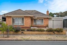  11 Edie Street Mansfield Park SA 5012 $650,000 Situated in a quiet street on a prized allotment of some 636m2 this classic 60's solid brick home offers so much potential and will appeal to first home buyers, family buyers or investors. Move in and enjoy 'as is 'or renovate and extend at your leisure. Comprising four generous size bedrooms, master bedroom is exceptionally large and together with two other bedrooms complete with built-in-robes. Light-filled lounge with big picture windows and sandstone fireplace surrounds and separate spacious dining adjacent the cool retro galley style kitchen. A striking terrazzo bathroom in mint condition and complete with full bath, shower recess and vanity, plus there is a separate WC and large laundry. Step outdoors to the rear verandah and a large yard that offers so much scope. Reinstate the yard back to a thriving sustainable garden and room for chooks, and there is room for a pool, an extension or plenty of space for children and pets to run freely. Looking for an impressive workshop, then this 33m2 brick shed with concrete floor, power and lighting will appear to car enthusiasts, handy persons or could easily be converted to a studio or a rumpus room. You are spoilt for choice as there is also another large shed at the rear. Additional features we love; - Front Window shutters - Secure carport for 3 cars - Split system air-conditioning unit - Security alarm system - Security front and back doors - Private and secure - 2 x Ceiling Fans - Floorboards under the carpets - Rinnai gas hot water service Positioned in this highly sort after location with the Frederick Street Reserve just metres away, easy access to the North South Motorway and only 12 kms to the Adelaide CBD. Great shopping facilities close by with either Arndale Shopping Centre or the Churchill Centre. Regency Park Golf Course, The Parks Recreation and Sports Centre. A choice of good public and private schools, Zoned to Woodville Gardens Primary and Woodville High and a short stroll to St Patrick 's Primary School. 