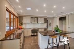 16 Marija Cres Berwick VIC 3806 $1,180,000 - $1,250,000 Rarely found yet often sought, this generously sized and modern home greets you with an expansive, welcoming hallway. Meticulously designed, its layout flows effortlessly. At the front lies the master suite, boasting a retreat, walk-in robe, and ensuite. Further down the hallway, you’ll find a separate power room for guests, the formal lounge and adjacent study which offers flexibility, with the option to convert back into a theatre room. The heart of the home showcases an open-plan kitchen, living, and dining area, ideal for family gatherings. The kitchen is a chef's delight, with stone benchtops, a 900mm free-standing oven/stove, ample storage, and stackable windows that open onto the alfresco area. A dedicated rumpus room provides a haven for kids' playtime or cozy movie nights. Nestled at the rear are three additional bedrooms, each bathed in natural light and equipped with built-in robes, serviced by a central family bathroom. Step outside to discover the ultimate in outdoor living, complete with undercover space, and a fully equipped kitchen featuring a BBQ, rangehood, sink, fan, heaters, and café blinds for year-round comfort. The thoughtfully extended outdoor area ensures ample room for large gatherings without compromising on backyard space. Additionally, the second garage presents an opportunity to create a personalized retreat, perhaps a man cave or bar. Noteworthy extras include wood Coonara, ducted heating, refrigerated cooling, ceiling fans, a ducted vacuum system, and solar panels. Situated in a central, convenient location with shopping, transport and schooling all in close proximity on a sprawling 802m² parcel of land – Making this the perfect place for your family to call home! Inspect now before it’s too late! 