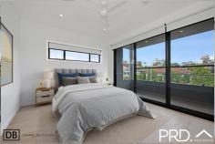  2A Gracemar Avenue Panania NSW 2213 $1,498,000 Architecturally designed with a focus on space, natural light and luxury, this beautiful home built by Arkitek Projects delivers the very best in low maintenance indoor/outdoor living. It enjoys a whisper quiet Panania South cul-de-sac location and is within an easy walk to Panania shops and station. Property Flyover: - Free flowing, open plan design with high ceilings. - Beautiful stone island kitchen features premium gas cooking and pantry. - Three large bedrooms all with built-in robes. - Master suite features a walk in robe, ensuite and balcony. - Contemporary bathrooms; main with freestanding bath & double vanity. - Living/ dining easily transitions to a generous covered outdoor alfresco, perfect for entertaining. - Level north facing, child-friendly backyard. - High ceilings, ducted air conditioning and alarm system. - Single lock up garage with internal access plus off street parking. - SUPER rare additional side access with double gates, perfect for boats, caravan, or extra storage. 