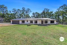  105 Yangoora Avenue Tinana QLD 4650 $860,000 To $875,000 This stunning near-new family home is situated on a secluded 5 acre* allotment in sought after Tinana. Built in 2021, this property offers 4 generous bedrooms, plus office, luxurious open plan living areas, stunning kitchen with large walk-in pantry, out-door entertaining areas, solar panels, tinted windows, air-conditioning, massive 13m x 7m* shed, dam with irrigation, dog fencing and more. The current owner has had a change in circumstance which has prompted a relocation. This gives you the opportunity to secure this fantastic property, your very own secluded sanctuary. At a glance; 4 generous bedrooms, main with walk-in robe, ensuite and air-conditioning Remaining bedrooms all feature built-in wardrobes and ceiling fans Stylish bathroom Stunning kitchen with quality appliances and large walk-in pantry Open plan design living and dining areas Ample storage throughout the home Tinted windows and doors throughout for privacy Great undercover outdoor entertainment area Out door fire-pit area Attached double garage, panel lift door, and internal access Massive 13m x 7m* shed and shade sale over fenced animal shelter Established trees Dam located on the 5 acre block, with various irrigation points Plenty of water with 3 x 5,000 gallon (22,700ltr)* rainwater tanks and 1 x 1,130* gallon (5000ltr) Fenced house yard, and dog enclosure 4.2m gate on driveway allowing for easy access of truck/s machinery if necessary Energy efficient with 7kw* solar panels newly installed 