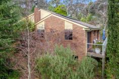  9 Mt Piddington Road Mount Victoria NSW 2786 $990,000 - $1,089,000 For those seeking a home that provides peaceful solace, living spaces to suit a growing family and colourful gardens hidden from neighbouring properties then this could be your ideal one. With ducted heating, a cosy slow combustion fire, newly installed reverse cycle air conditioning and solar panel efficiencies there is much to take advantage of. A beautiful full length deck overlooking the gardens below is a place for relaxed socialising or quiet reflection with birdsong all around. Only approximately 800m to the local cafes, train station and the iconic Mount Vic Flicks, this one is certainly worth adding to your priority viewing list. Breakdown of Features: Fully fenced with attractive gated entry; double garage with excellent workspace to rear Generous additional under house and garage storage offering standing height accessibility Established flora with pretty garden 'rooms' for exploration and space for chickens to roam Main entrance leading down to bedroom accommodation and separate zoned living areas Ducted gas heating; reverse cycle a/c; main living with s/c wood fire and tree canopy views Spacious open plan kitchen, dining and casual living with sliding door out to full length deck Master bedroom with deck access, walk-through robe and neatly presented shower ensuite Plenty of natural light throughout, built-in storage in bedrooms 2 and 3, hallway linen closet Upgraded family bathroom with sunken bath, separate shower; practical separate WC Excellent position within easy walk/800m of great local cafes; city train links & Mt Vic Flicks 