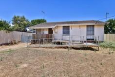  1 Vine Court Ouyen VIC 3490 $145,000 - $159,500 How does a 9% return sound? This three bedroom home in an extremely rare court setting in Ouyen is leased at $270 per week. Front porch with ramp, roomy lounge with split system & ceiling fan, functional bathroom & tidy kitchen. Spacious three bedrooms (2 with split systems for heating/cooling). Side access to the large 954m2 (almost 1/4 acre). With 9m x 6m colorbond shed with concrete floor and dual roller doors & PA door. This is a great little investment to kickstart or add to your portfolio. 