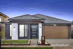  7 Taggiasca Dr Wollert VIC 3750 $695,000 - $720,000 A World Of Modern Refinement And Family-Centric 4 Bedroom Home.   This Remarkable House Features :-   - Master Bedroom With Ensuite Shower, Stone Benchtop and Walk-In Robe - Other Additional Bedrooms With Built-In Robes. - Fully Tiled Central Bath - Heaps Of Storage Space With Walk In Storage. - Quality Flooring - Remote-Controlled Double Garage - Heating And Cooling. - Downlights Throughout - Open Living And Dining Area. -  Stylish Kitchen With 900mm Cooktop And Rangehood - Dishwasher - Splashback In The Kitchen. - High Ceilings And High Doors - Stone Benchtop In Kitchen, Bathrooms And Laundry. - High-Quality Fixtures And Fittings Throughout. - Low-Maintenance Landscaped Front And Rear Yards . - Exposed Aggregate Driveway -Impressive Facade 