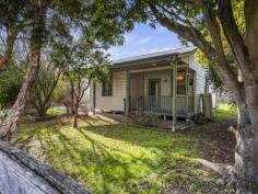  12 Victory Ave Foster VIC 3960 $410,000 Set on approximately 653m2 of land just a short flat walk into the centre of the township, this character cottage has much to offer. Behind the post and rail fence, the wide front verandah with a screening of feature trees for privacy. Open plan living room with wood heater. Two bedrooms - master semi-ensuite to the modernised main bathroom. Kitchen with new cabinetry, electric stove and room for meals area. Rear verandah catches the morning sun and enjoys views out over the fully fenced rear garden with established fruit trees and bungalow. Ideal for first home buyers, downsizers, or investors, with potential to build a large shed (STCA) or subdivide (STCA) - if location is important to you. 