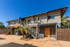  10 / 46 Tanami Drive Bilingurr WA 6725 $415,000 Located in the well established Broome North estate, this apartment is elevated on the first floor. The complex is well maintained, with a carport for each apartment, and amenities & parklands just a short walk away. Both bedrooms are well-appointed and adorned with carpet, split aircons and built-in robes. The soft toned roller blinds accentuate the sleek design appeal which resonates in all rooms throughout. Gloss tiled flooring lines the rest of the property and brings a sleek appearance to the open plan living layout. Your new kitchen is stylish and chic, so the home chef can enjoy oodles of cabinetry, charcoal hues and glistening tiled splashbacks. The bathroom is much the same and incorporates a convenient laundry nook too. The trough is inbuilt as to not intrude on the luxe aesthetics. Full height tiling is highly appreciated, and a single fixed shower screen partition cuts cleaning time in half! Apartment living can be compact, and that's why you'll love the balcony! Check out sky views from your private upper-level platform. It's got some uber modern sass, between a charcoal feature wall and the stacked stone facade. And it's the perfect combo of both shaded privacy and sun seeking space for your houseplants! 