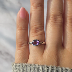 The delicacy of the  dainty amethyst ring  , curated in 925 sterling silver, is a beauty. The dainty design and soft purple shade make it the perfect accessory for any outfit. The sparkling effect of amethyst gemstone adds a touch of elegance to everyday attire. It's a subtle yet stunning jewelry piece that never fails to draw compliments. This dainty ring is a true embodiment of understated glamour & exquisite beauty.