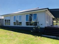  5469 South Gippsland Hwy Agnes VIC 3962 $450,000 Superbly constructed with attention to detail, set on approx. 1949m2 of land with views to the mountains of the Prom to the south, and over adjoining farmland to the north. Light filled open plan interior with stunning polished solid timber flooring featuring in the living / dining room, opening out to a covered entertaining deck. Comfortable year-round with RC/AC for convenience and a wood heater for ambience. Magnificent kitchen with 900mm gas hob, under bench oven, dishwasher and feature benchtops of recycled timber. 3 double bedrooms, all with robes. Magnificent spacious bathroom with highlight window, frameless shower, spa bath, feature vanity and w.c. Practical laundry / utility room. So many extra features - 3.6kW of solar plus mains, instant gas hot water, tank and town water, double glazing, high speed NBN. Carport plus LU shed with concrete floor and power. Fully fenced, auto gates and perimeter planted with natives. Parking for several boats, vans, cars or machinery. Opposite access to the Great Southern Rail Trail and located right in the center of the Toora and Welshpool boat ramps, with less than 15 minutes to the pristine water in either direction. Or head up into the hills and visit the spectacular Agnes Falls, just 14km from your doorstep. Such a handy location to explore the very best this region has to offer. 