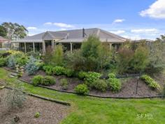  305 One Chain Road Kardella VIC 3951 $1,135,000 Situated on 2 acres, overlooking expansive grazing properties with uninterrupted panoramic water views across the Western Reservoir, the green hills of the Strzelecki ranges and beyond towards the coast and Wilsons Promontory. This generous brick veneer family home with such commanding views could be your ideal lifestyle property. The home features: - North facing kitchen, dining, and living with view capturing windows. - The kitchen has generous bench space with gas cook top, electric oven, dishwasher and walk in pantry. - From tiles to the carpeted living space with reverse cycle air conditioner and cast-iron wood heater for those winter days. - A study nook off the living space is ideal for small home office. - Decked veranda expands out three sides to capture the views creating a spacious north facing entertaining area. - Five bedrooms all with built in robes, currently utilised inclusive of parents retreat and study, with the master complete with ensuite and walk in robe. - Family bathroom with double vanity, shower, spa bath and separate toilet - Separate laundry in addition to 2 car garage providing direct hallway access inside. - High ceilings throughout, all new recent updates with painting and carpets Externally: - Set on 2 acres (approx.) on a gentle rise and sheltered from the southwest. - 3 well fenced paddocks, ideal for a pony, sheep, or let the neighbours cows in! - Ample workspace and storage in the impressive shed 12m x 12m barn, fully concreted with power. - 90,000 L water tank storage providing ample water for residence and property. - Superb solar system, comprising (34 Panels) with solar hot water/electric back up. - Surrounding the home is a gorgeous low maintenance garden with a delightful pond courtyard soaking in the north sun and views. Located 7 mins to Korumburra, 15 mins to Leongatha, 30 mins. to Inverloch, 40 mins to Warragul and 90 mins to Melbourne. And for those that love to walk, run, or ride a bike, just a couple of minutes down the road in beautiful Kardella you have access directly onto the Great Southern Rail Trail! It is a credit to our vendor for the love they have bought to this property, and now it is time for a new custodian to enjoy the garden, birds, and magnificent views. 