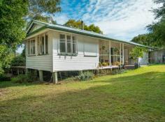  9 Magpie Lane Gowrie Junction QLD 4352 Consisting of mainly flat land, 12 ha (29.65 Acres) plateau to the north, 9 ha (22.24 Acres) gentle sloping land fronting Gowrie-Tilgonda Rd, divided by approximately 2 ha (5 Acres) of escarpment. Offering a comfortable 3 bedroom home, large eat in kitchen, enormous lounge room, 2 large verandas & front patio. Bathroom with shower, separate WC, the separate 5 acre portion of the property to the south offers development potential - zoned; rural residential, 15 minutes to Highfields, Toowoomba & all major amenities. • Bitumen Road to Plateau Entrance - Via Baxters Road • Two Bores - 100,000 Litres Storage - 6 Tanks • 3,000 gallon p/h bore - Stock & Domestic • Solar Power - 5 kilowatts • Solar Hot Water • Electric Appliances • Induction Cooktop • Pasture - (One Paddock - Katambora Rhodes Grass) • Several Sheds • Fences - Partially Fenced • Variety of Citrus & Nut Trees • Garden - Extensive Native Species 