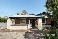  15 Goldfinch Ave Cowandilla SA 5033 This character bungalow, with red brick facade has stood as a proud family home since 1926. Abundant in potential for enhancement, this beautifully blank canvas of opportunity showcases three bedrooms and spacious living options, complimented by decorative high ceilings, ornate timber fretwork and ambient feature fireplace. Conveniently nestled between the city and the sea in this thriving eclectic community and sited on a generous allotment of 797sqm. Sited on a generous allotment of approximately 797sqm, in a flow through design expected of the property’s vintage. A formal lounge at the end of the central hallway, connects to the kitchen and dining, while a rear rumpus has large picture windows to the established gardens of the rear yard. The impressive feature list of this home stretches beyond its modest beauty and untapped potential, offering family accommodation of three bedrooms, all with built in robe storage, main bathroom with bath and the convenience of a second water closet to the laundry. Features to love; • Explore the potential of this family sized allotment of 797sqm • Functional kitchen with breakfast bar and stainless-steel upright cooker • Ducted reverse cycle air conditioning • Secure off-street parking and garage plus a fenced vegetable garden and workshop to the rear of the allotment • Zoned for Underdale High School with other nearby schooling options including St Johns Bosco School, St George College, Warriappendi School, Tenison Woods Catholic Primary School and Nazareth Catholic College. • Walking distance to Hilton Plaza Shopping centre, local restaurants and the City of West Torrens Library and playground. • Easy access to Kooyonga Golf Club 