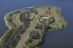 Bimbadeen means place of waterbirds - a waterfront acres sanctuary with 300 degree lake views, fishing, boating, sailing, flying??? Frontage to beautiful Lake Macdonald overlooking Noosa's botanical gardens. Private driveway is boarded by water on either side, with exotic wildlife and magnificent views to Mt Cooroy & Tinbeerwah. The perfect combination of being only 5 minutes from Cooroy and 15 minutes to Noosa, with town water, sewer and peace and tranquility. Sprawling brick residence with raked ceilings, french oak floors, gourmet kitchen, gas & induction cooking and ducted air conditioning. Solid timber doors & windows throughout. 3 separate living areas, wide entertaining patios, 4 car garage and boat store/cellar under the home.
500m Bitumen airstrip, fully insulated 2 plane hangar with workshop, separate machinery shed and van port.
Stroll the park like acreage on this resort style sanctuary tailored for relaxation. Host a tennis party on your own flood lit tennis court. This property is your opportunity to live the dream, own or operate an aircraft, also ideal for car or boat enthusiast with 2 large quality sheds and 3 phase power.18.29 acres/7.4 hectares. For further details or inspection please contact our office. rh06506

Bimbadeen - 18.29 acressealed airstrip2km Lake Frontplane hangar and shedstotally private