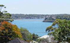  70 Loftus Street, Bundeena NSW Iconic Beach House One of the first houses built in Bundeena, this iconic sandstone-based house has stunning northerly views across the Hacking to the city which can never be built out. Recently renovated, with two bedrooms and a bathroom, there's still loads of scope to expand into the downstairs area which is currently used for storage. Situated a short walk from the shops, ferry, club and Horderns and Gunyah beaches, the location is truly stunning. At the back there's a garden and barbeque area with outdoor shower, perfect for entertaining after returning from a day at the beach. As a holiday rental, you could make around $300 per night, and be able to use the cottage yourself whenever you want to get away. As a home, there's no better place to live than Bundeena, where the community and lifestyle are are second to none. Your own beach pad in "the Palm Beach of the South", plus an income? What are you waiting for? You'll be waking up to the sound of the sea before you know it 