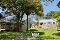  70 Loftus Street, Bundeena NSW Iconic Beach House One of the first houses built in Bundeena, this iconic sandstone-based house has stunning northerly views across the Hacking to the city which can never be built out. Recently renovated, with two bedrooms and a bathroom, there's still loads of scope to expand into the downstairs area which is currently used for storage. Situated a short walk from the shops, ferry, club and Horderns and Gunyah beaches, the location is truly stunning. At the back there's a garden and barbeque area with outdoor shower, perfect for entertaining after returning from a day at the beach. As a holiday rental, you could make around $300 per night, and be able to use the cottage yourself whenever you want to get away. As a home, there's no better place to live than Bundeena, where the community and lifestyle are are second to none. Your own beach pad in "the Palm Beach of the South", plus an income? What are you waiting for? You'll be waking up to the sound of the sea before you know it 