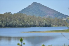 Bimbadeen means place of waterbirds - a waterfront acres sanctuary with 300 degree lake views, fishing, boating, sailing, flying??? Frontage to beautiful Lake Macdonald overlooking Noosa's botanical gardens. Private driveway is boarded by water on either side, with exotic wildlife and magnificent views to Mt Cooroy & Tinbeerwah. The perfect combination of being only 5 minutes from Cooroy and 15 minutes to Noosa, with town water, sewer and peace and tranquility. Sprawling brick residence with raked ceilings, french oak floors, gourmet kitchen, gas & induction cooking and ducted air conditioning. Solid timber doors & windows throughout. 3 separate living areas, wide entertaining patios, 4 car garage and boat store/cellar under the home.
500m Bitumen airstrip, fully insulated 2 plane hangar with workshop, separate machinery shed and van port.
Stroll the park like acreage on this resort style sanctuary tailored for relaxation. Host a tennis party on your own flood lit tennis court. This property is your opportunity to live the dream, own or operate an aircraft, also ideal for car or boat enthusiast with 2 large quality sheds and 3 phase power.18.29 acres/7.4 hectares. For further details or inspection please contact our office. rh06506

Bimbadeen - 18.29 acressealed airstrip2km Lake Frontplane hangar and shedstotally private