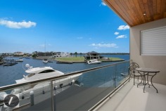 Modern contemporary elegance would best describe this stunning three-level home, perfectly positioned on the waterfront overlooking the wide open canal and out to the Broadwater. From the striking water feature in the entry, through to the incredible kitchen with backlit glass feature, this home provides the very best in indoor and outdoor luxury lifestyle. Whether you are after an impressive bar and entertaining area on the waterfront, or a huge man cave including 12 person spa, this is the house for you!

This home's features include:

-	6 bedrooms
-	5 bathrooms
-	3 powder rooms
-	10 car basement garage
-	North-to-water aspect
-	28 m* waterfrontage
-	Great floor plan with void creating abundance of light and space
-	Stone, marble and water features provide a warm ambience
-	Floor to ceiling glass bi-folds create the ultimate in seamless indoor/outdoor living
-	Sunken formal lounge with gas fireplace
-	Floor to ceiling glass creates spectacular frame for the sensational water views
-	Open plan living areas taking full advantage of the views
-	Fabulous kitchen with backlit glass feature, stone bench tops, wine fridge, Miele appliances including coffee machine
-	Stunning outdoor entertaining area with electronic shutters, stone benches, bar area, cold room, wine fridges, sink and BBQ - and a big screen TV!
-	Another open air entertaining terrace on the waterfront, next to the in ground heated lap pool with plunge pool
-	Tiered theatre with premier home theatre system, a bar and its own powder room
-	Impressive master suite on ground floor with stone feature wall above the vanities, enormous stand-alone bath
-	Master also boasts large walk-in robe with shoe and handbag display areas
-	Upstairs the 2 large waterfront bedrooms are ensuited with superb views
-	There are also 3 bedrooms built especially for the kids with built-in daybeds, which share a bathroom
-	Enviable 'man-cave' in basement, with sliding doors, plenty of room to create the perfect den for your needs
-	Just outside the den area is a 12-person spa
-	Also in basement you will find a dedicated gym room with TV and floor-to-ceiling mirrors, beauty room and bathroom
-	Schindler's lift to all levels
-	Polished timber floors upstairs
-	Floating pontoon with 15m* pontoon
-	Superb position in canal with views out to the open Broadwater
-	Fully fenced with secure gatehouse at front
-	Fully automated C-bus system
-	Reverse cycle ducted air conditioning

Located in a quiet cul-de-sac in a prestigious street surrounded by other waterfront mansions, you are in good company! The Sovereign Islands is a unique island community providing 24 hour security with patrols. Private, luxurious and secure, yet so close the cafes, restaurants, shops and parklands of Paradise Point.

Call Shaun today to arrange your private inspection.