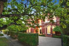  15 Avondale Road, Armadale VIC One of Melbourne’s most beautiful homes in one of Armadale’s most attractive addresses, Avondale Hall (1911) balances classical Queen Anne Revival elegance with a contemporary consciousness that means its illustrious spaces respond beautifully to current day family needs. The romance of the external aesthetics is immediately matched by the stylishness interior proportions including refined, yet user friendly formal sitting and dining rooms, each defined by bay windows and period fireplaces. A light filled family room which faces the northerly rear garden is complemented by separate kitchen and everyday dining areas opening to the evocative rear verandah, lush lawns and solar heated pool. Five inviting upstairs bedrooms, include a majestic main bedroom with double shower ensuite. The four further bedrooms surround a sunny central bathroom. Hydronic heating. Attic and cellar storage. Return drive off street parking. Perfection.  