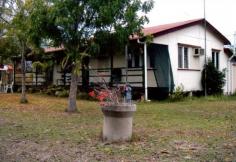 27 CARTYS Street, Millaroo, QLD - Brandon's Real Estate If you're after a very affordable home in a quiet country area then this
 solid timber and fibro home could be just what you're looking for. The 
home has its privacy but still has the convenience of town water,weekly 
garbage service, sealed road frontage, daily school bus and mail is 
delivered 3 times a week. The property is situated 45 minutes from Ayr 
and Home Hill and is just across the road from the local pub social 
club, swimming pool, tennis courts and only 200 metres from the Millaroo
 Primary School. The home has two spacious bedrooms, main with 
air-conditioning, a combined kitchen and dining area, a large lounge 
with air-conditioning, a front veranda, a store room, laundry, second 
toilet and outdoor shower. The property also features a near new 8x8 
metre shed and 2 rainwater tanks, is partially fenced on a 1206m2 
freehold allotment. Annual rates are only $1000 approximately. Call 
today for an inspection! 