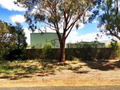 39 Fishburn St Cowra NSW 2794  The property is in an I2 Zone and has further development potential. A level, well fenced block in Fishburn St (a popular area for Light Industry), offering 1.88 HA (4.6 acres) in area & comprises a 93m frontage & 200m depth with 2 access points. Power, Phone and Water are available. Main shed constructed of steel frame and colorbond cladding and roof. It has a concrete floor, 3 large roller doors and one PA door. Adjoining this shed is a built-in weighbridge. 2nd shed is used for an office / staff area and is also colorbond construction. There is also an amenities modular building. (shower, hand basin, toilet) Call for more details. 0418 699080 Wayne Heilman   Property Snapshot Sale Price: By Negotiation Building Area: 250 m2 Site Area: 2 ha Property Type: Light Factory Uncovered Parking: 10 Total Parking: 10 Features: Container Access Heavy Vehicle Access Shower Vacant Possession Vehicle Access 