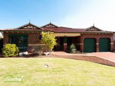  48 Fairway Circle Connolly WA 6027 Discover this polished & elegant home that offers a rare executive lifestyle.  It is the ideal buy for the family in the search of space and class in a desirable suburb.  Upon your arrival, you will walk pass the verandah, go through the front door and discover a polished Entry Hall. The first visible areas are the beautiful Lounge and the Dining both featuring timber flooring. Continue your journey and view the large living areas boasting high ceilings or choose to visit the spacious bedrooms. The Master Bedroom has a walk-in robe and a modern Ensuite with a supersized shower and a separate toilet. The versatile Study can be set up as a home office or converted into a 5th  