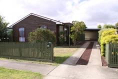 6 Bellara Court, PORTLAND VIC 3305 3 bedroom Western Red Cedar Home - 105m2 - 2 way bathroom - walk in robe off the main bedroom - Bathroom has separate spa bath, shower and separate toilet. Gas instant hot water. Good sized laundry with easy access to the clothesline. Modern kitchen with ample cupboard and bench space and dining area. Fresh feeling lounge room with a computer room off to one side, great for kids to play while watching the news. All gas appliances for heating and cooking plus an added bonus a free standing wood heater to produce that cosy feel that you only have with wood. Coupled to this are these added features of note - outside eating area - a fernery - Lock up shed approx. 4.2m x 9.2m - Large carport 11m x 6m - great entertainment area that is concreted. Fully fenced house yard and the back yard ls also fenced - gardens have edging in place and a sprinkler system is in place. This property is ready for you to move in without any more to be done and is situated in a quiet court close to schools. 