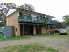  20 Broadoaks Rd Old Bar NSW 2430 ust far enough to enjoy the serenity of 
rural living with the river firmly in your sights yet close enough to 
enjoy Old Bar, its pristine beaches and all that Taree has to offer. 
Nestled on 4.04 hectares (approx. 10 acres) with good fencing and 
stables the paddocks have been set up for horses. The home is two 
storeys to capture the views and big enough for the larger family with 
five big bedrooms, two bathrooms and living areas on both levels. The 
idea lifestyle block for just $448,000. 
 
   
 
 Property Snapshot 
 
 
 
 Property Type: 
 House 
 
 
 Construction: 
 Brick 
 
 
 Features: 
 
 Built-In-Wardrobes 
 Decking 
 Large Shedding 
 Storage 