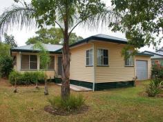  6 Adcock St Dalby QLD 4405 OPEN TO INSPECT SAT. 23rd AUG. 10.00 - 10.40 Here's your chance to buy into a tightly held position on the western side of town. This would make a great starter home or a valuable addition to your investment portfolio. All 3 bedrooms are carpeted and have ceiling fans. The main bedroom is easily accommodates a king-sized bed, and bedroom 3 has a floor-to-ceiling built-in robe. The lounge/dining boasts beautifully polished timber floors and reverse cycle air-conditioning to beat the seasons. The kitchen has been updated to a modern country feel with plenty of cupboards, pantry & gas cooktop. The bathroom has also been updated in recent years to include a separate shower & tub, and is conveniently located between bedrooms 2 & 3. Accessible from the dining room is the large covered & paved outdoor area overlooking the backyard. An adjoining shaded fernery complete with fishpond gives a private & tropical feel. Car accommodation for 2 vehicles is provided by an attached drive-thru carport plus a single garage with power and both have a roller door for security. Overall, this is an extremely solid and comfortable home and the location is unbeatable with no flood worries! You don't want to miss out on this one, so book your inspection now!     Energy Efficiency Rating:     0.0-star NABERS Energy Rating 