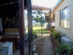 16 Russell St Chinchilla QLD 4413 
 4 bedroom iron cladded home with steel stumps on lg 1012m2 allot. 
Semi-mod kitchen w/ walk in pantry and electric stove. 3 bedrooms have 
built in cupboards. Evap air con throughout & s/s in main b’rm with 
the large lounge room having a wood heater. The bathroom has been 
renovated. An extra family room adds that extra space everyone looks 
for. All floors are polished and carpet to the bedrooms. Double batts in
 the walls & ceiling makes this home very comfortable in all 
weather. Exterior features include rear patio with a shaded bbq area, 
fully fenced yard, small rain water tank, dbl carport & storage 
shed, dbl garden shed & solar panels with 3kw invertor on the new 
roof to save on power bills. With the home situated to one side of the 
block, this would suit the developer to build again. Currently rented at
 $400 p/w. 
 