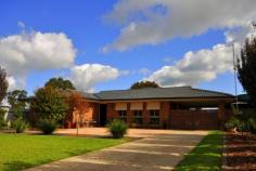  19 Welton Street Holbrook NSW 2644 It would be hard to find a feature or detail on this outstanding brick veneer home that hasn't been given the renovation treatment ideally located along side parkland. The home comprises of 3 bedrooms with built-in robes, good size open plan tiled lounge meals area, modern kitchen complete with electric cooking and dishwasher, modern bathroom has spa bath and separate toilet, ducted cooling throughout and reverse cycle split system air conditioner. Outside offers a meticulously kept enclosed back yard with a 4m x 9m covered back verandah, 4m x 8.5m colorbond shed, 3m x 3m garden shed plus 3m x 4m brick storage area and double carport situated behind gates. Magnificently kept inside and out offering space, style and ample storage shedding is sure to win your heart. 