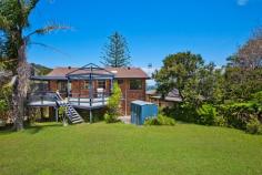 51 North Avoca Pde, North Avoca This quintessential family beach house is situated directly opposite 
the surf and sand at North Avoca. Pine View is a comfortable pet 
friendly house with filtered ocean views from its living spaces and main
 bedrooms. Recently upgraded and freshly painted, Pine View is a relaxed
 two storey holiday house which offers open plan spaces, two living 
spaces each with a DVD player, two large entertaining decks, stunning 
sea breezes and a huge yard for the kids or pets to play. This inviting 
holiday house features a timber and beach theme throughout which adds to
 its appeal. Enjoy a 10 minute walk along the sand to Avoca Beach where 
you can enjoy a coffee or meal and take the kids paddle boating in the 
lagoon. Pine View is a five minute drive to Terrigal beach, eateries and
 shops and a 15 minute drive to Erina Fair shopping centre. On the upper
 level master bedroom contains queen bed, built-in robe, deck access and
 ocean views while bedroom 2 contains a double bed. On the lower level 
bedroom 3 contains a queen bed, built-in robe and ocean views, bedroom 4
 contains two single beds with built-in robes, while bedroom 5 contains a
 tri-bunk bed. 
 Living space contains flat screen TV, DVD player, air conditioner, ceiling fans, views Kitchen contains a dishwasher, electric cook top, microwave, fridge, double sink Ample decks, one with sun lounge and views; other has gas BBQ, table setting for 10 Large fully fenced pet-friendly grassed yard; outdoor shower; close to cafes and shops Wi-Fi internet; ocean breezes; tasteful decor; laundry contains a washer and dryer Stylish bathrooms on both levels; main with combined bathtub/shower and toilet 