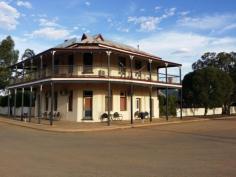   88 Parkes Street, Burracoppin WA 6421 The Burra Pub �Circa 1926� Iconic Wheat Belt Landmark Prime Great Eastern Highway location midway between Perth and Kalgoorlie is the hard to miss Burracoppin Hotel. This grand old lady of the wheat belt sits in the centre of a thriving farming community with massive daily passing trade. Currently closed for business while undergoing a revamp to restore its hidden former glory.  The current owners use the Pub as their private residence enjoying an enviable lifestyle.  Full brick construction with features which include high ceilings, polished original jarrah flooring, a massive dining room, six bedrooms, 3 with French door access to wide upstairs verandah and the original, fully functional public bar has to be is the best husbands retreat you could hope for.  The Pub is sited on the corner of one of five quarter acre blocks totaling over 5000sqm so there is plenty of room for additional accommodation/expansion too. The current owners have already invested heavily in tie and money yet circumstance now forces a change of plans so sadly, this old dear must go.  Whilst still requiring some work to become licensed premises again, this can be achieved without heavy cost and so presents a perfect opportunity to get into the hotel business while enjoying that sought after a country lifestyle.   