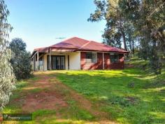  45 Alawoona Circle Bullsbrook WA 6084 This well appointed home will impress all along with the spectacular valley views to the south of this well positioned quality 4 x 2 home. Take a drive out see for yourself. You must put this one on your list if you are thinking of living out here. At this price, the home won't last. HOME OPEN BY APPOINTMENT. Some of the features of the home are: - Good size master bedroom with large ensuite complete with italian tiles, double shower, large bath and twin vanities - BIR's and carpet in all bedrooms - Separate home theatre - Activity room near bedrooms - Appealing tiles throughout which flow onto the Alfresco - Huge kitchen with island complete with good size island - Stainless steel gas stove top and electric oven - Home just completely repainted inside - just move in! - Large entrance hall with feature wall - Ducted reverse cycle air conditioning - Double carport with remote control roller door - Reticulation - Solar hot water system - Free 12 mt x 9 mt shed (not assembled) - 20 ft sea container (optional) - Biosystem 2000 septic - 150,000 litre water tank 