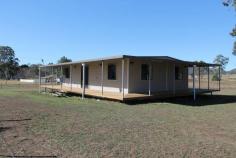 77 Watts Street, MARYVALE, QLD   3    1   77 Watts Street Located in the country town of Maryvale is this brand new (never lived in) 3 bedroom home. All 3 bedrooms have built-in robes and ceiling fans, 2 would comfortably fit queen beds and the other would fit a double.  The bathroom features a shower over bath, vanity and toilet and the laundry is located outside.  The open plan living is very spacious and has a large living room with ceiling fans and a dining/kitchen combo that has an electric cook top, electric oven and rangehood overhead and a double sink.  Outside the home is a very practical wrap-around deck, great for all occasions and a colorbond garden shed.  The home is situated on a large 2676m2 fully fenced allotment with bitumen road frontage and is in walking distance to the Maryvale Crown Hotel. This home has never been lived in and would be excellent as an investment, first home or someone looking to downsize to a peaceful country lifestyle that is only 25 minutes from Warwick and 90 minutes to Brisbane. 