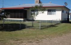  27 West St Millmerran QLD 4357 
			 Renovated 3 b/r home set on 10.94ac – Suit Horse Enthusiast or 
Subdivision – Fully renovated 3 bedroom home, 2 b/rs with built-ins 
& ceiling fans, new kitchen with electric oven, ceramic cooktop, 
display cabinets, pantry & dishwasher, combined with dining and 
lounge room, office, polished timber floors throughout living area, 
linen cupboard, bathroom with shower & vanity, laundry, evaporative 
cooling, new paint inside & outside, bully screened front verandah, 2
 car carport, 6000gal tank water connected to house, 8m x 12m shed, 2 
car access, 2 open stables, 5 yards, water to stables, fenced into 2 
paddocks, water connected to one paddock. This is a unique opportunity 
to purchase a large allotment within the town boundaries. 
		 