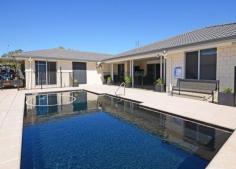 32 Ronaldo Way, Urangan Beautifully designed, this home is perfect for the large or extended family. 
 
Open plan, quality tiled gourmet kitchen, dining and living areas. Caesar stone bench-tops and dishwasher. 
 
Perfect for Queensland living, the entertainment area overlooks a stunning in-ground pool. 
 
Roomy bedrooms have a separate activity room, perfect for the children. 
 
Master bedroom is extra large and has its own en-suite and walk in robe. 
 
Separate games room/student or granny retreat, with a "wet area" bar, bathroom, laundry and study area. 
 
Multi media room air-conditioned by one of three split systems. 
 
Other features: Easy maintenance, large shed at rear, close to schools, and more... 