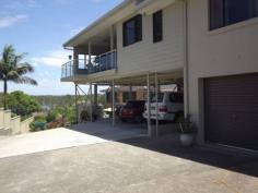  161 Lyons Rd Sawtell NSW 2452 Luxury home recently renovated with 
panoramic views of the Estuary. An executive residence over 2 levels 
with seamless indoor/outdoor living/entertaining. 
 
Accommodation: master bedroom with huge walk through wardrobe and ensuite and terrace/deck overlooking estuary 
 
3 bedrooms and main bathroom in separate wing. Huge open plan living with great natural light and deck with 6 person spa. 
 
Downstairs is a double garage (auto door) plus separate shower & 
toilet plus 3 fully protected carports (ideal for trailer/caravan). 
 
Location is walk to Sawtel shops, beach golf club with bus past the door. 
 
For Sale: $985,000 
Inspect: By Appointment 
Contact: Graeme Hennessy 0412 046 611 
 
   
 
 Property Snapshot 
 
 
 
 Property Type: 
 House 
 
 
 Land Area: 
 943 m 2 