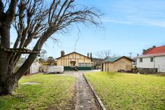  30 Maitland Street Uralla NSW 2358 • 	 This well presented three bedroom home is situated just a short walk to the town centre. • 	 The double bedrooms and the large lounge room with high ceilings lead off the wide hallway. There is a slow combustion wood heater plus a gas outlet in the lounge room that leads on to the north facing sunroom.  • 	 The hallway leads into the dining area and kitchen with a gas cooktop. This area adjoins the bathroom and leads through another hallway with storage cupboards to the laundry. • 	 There is a separate garage and the house is surrounded by established gardens and trees.  A GREAT OPPORTUNITY TO OBTAIN A CLASSIC HOME WITH HEAPS OF POTENTIAL FOR IMPROVEMENT 