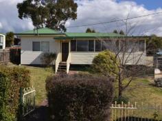 11 Cary St Wallerawang NSW 2845 AFFORDABLE FAMILY HOME Situated on the high side of the street with views back to town, this 3 bedroom vinyl clad home is well worth a look. Featuring 3 good size bedrooms, large modern kitchen with electric cooktop plus breakfast bar, large dining room with log fire, neat and functional bathroom, plus a sunny Queensland room attached to the front of the home adding extra living space. The large laundry space could also be fitted out to provide ample internal storage. At 1012 square metres there is plenty of room to move outside. The sunny rear yard has some raised veggie garden beds and assorted fruit trees plus a good sized chook pen and garden shed all ready for someone who enjoys their own produce. Plenty of space for a large garage as well. Get in quick on this one!   Property Snapshot Property Type: House Aspect Views: easterly aspect Construction: Cladding Zoning: village V(2) House Size: 89.00 m2 Land Area: 1,012 m2 Features: Dining Room Formal Dining Room Fully Fenced Yard Garden Shed Lounge Sunroom