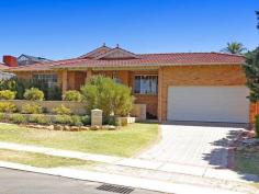  23 Aristride Avenue Kallaroo WA 6025 This is a real treat to the family who needs space. The newly carpeted master bedroom is spacious with a walk-in robe and an ensuite. The other three secondary bedrooms are similarly large and spacious. As you walk through the main door, a pretty chandelier will greet you and welcome you into a huge theatre room, with fresh new carpets and beautiful wooden blinds. Walk into the chef kitchen with its modern appliances that looks out into the crystal clear water of the below ground pool, securely fenced up by clear glass panels. The kitchen has separate dining, family and lounge areas all having great visibility to the external pool and garden areas. Freshly painted and with some new window treatments, you can feel the comfort and luxury of space as you spend your time here with family and friends. A large laundry area at the back leads you to the outdoor area with plenty of garden space, a garden shed, and a rain watertank. The garden is reticulated and a big covered patio allows much outdoor dining and activities. The house is ducted throughout with reverse cycle air conditioning, has a double lockup carport, and located near to the beach, the shops, the park, the schools, and public transport. Not to be missed, call for an inspection. 