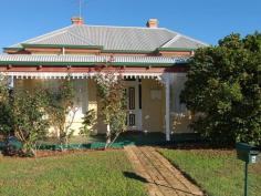 5 Bertie Street, Guildford READY FOR REVIVAL!
 Wonderful circa 1900 brick & iron cottage.Bay
 windows,central hall,wide jarrah boards,open fires & high 
ceilings.Terrific location in quiet side street only a short walk to 
Guildford Grammar with the Rose & Crown & cafe strip just 
around the corner.A very livable home as is with great potential to add 
your own style.
 