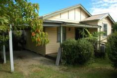  24 Clarke Street Wyndham NSW 2550 This classic 3 bedroom timber clad home is nestled right in town between the Wyndham Town Hall and two Churches. This lovely old home has been renovated recently with a new bathroom and a beautiful new modern kitchen complete with stainless steel appliances including gas cooktop and dishwasher. The house features a generous sized living room with timber flooring, raked ceilings and a wood heater, a separate dining room, large bedrooms (built in robe to main), 2 covered and private verandas and a single carport. 