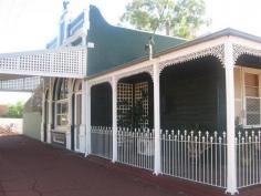 36 Bayley St Coolgardie WA 6429 IVORY'S CORNER - CHARACTER HOME $275,000 You will fall in love with this gorgeous character home in Coolgardie. Set on 1012sqm this heritage home built in 1896 was once know as "Ivorys Corner" and is complete with stained glass windows, picture rails and 14 foot high ceilings. Features of this property are 2 bedrooms, modern kitchen, meals area, lounge room, activity area, additional sitting room in back of house, split system air conditioner to lounge room and main bedroom, alarm security system, verandah to front, side and back, big patio with built in BBQ, 2 large worksheds plus smaller garden shed, large rain water tank. There is also a free standing gazebo which is great for entertaining