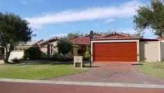  12 Taroona Lane Currambine WA 6028 Well established, renovated home comprising 4 bedrooms 2 bathrooms, shoppers 
entrance into mud room (ideal for storage or study), separate activity room to 
children's zone, lounge/dining room, open plan meals / living area and 
beautifully renovated chef's kitchen with engineered stone bench tops and 
breakfast bar,under mount double sinks, 900mm gas cook top, range hood, Bosch 
dishwasher, walk in pantry and double fridge recess with water tap. Walk 
out to a large pitch roof patio and fully fence below ground salt water 
fiberglass pool with spa jets, established reticulated gardens and lawn 
area. Extra features include: - 2.3KW (with 3KW inverter) solar 
panels - 3 reverse cycle split system air conditioners - engineered black 
butt timber flooring throughout (no carpets) - BIR's - ample storage to 
laundry with overhead and under bench cupboards - double enclosed carpet with 
auto door and extra covered storage area - new gutters and recent new gas 
storage hot water system - gas point to lounge Great location close to 
Currambine Shopping Centre, cinemas, new restaurants/cafes, easy access to 
transport and freeway, 5 minutes drive to Joondalup City, beaches and lake. 